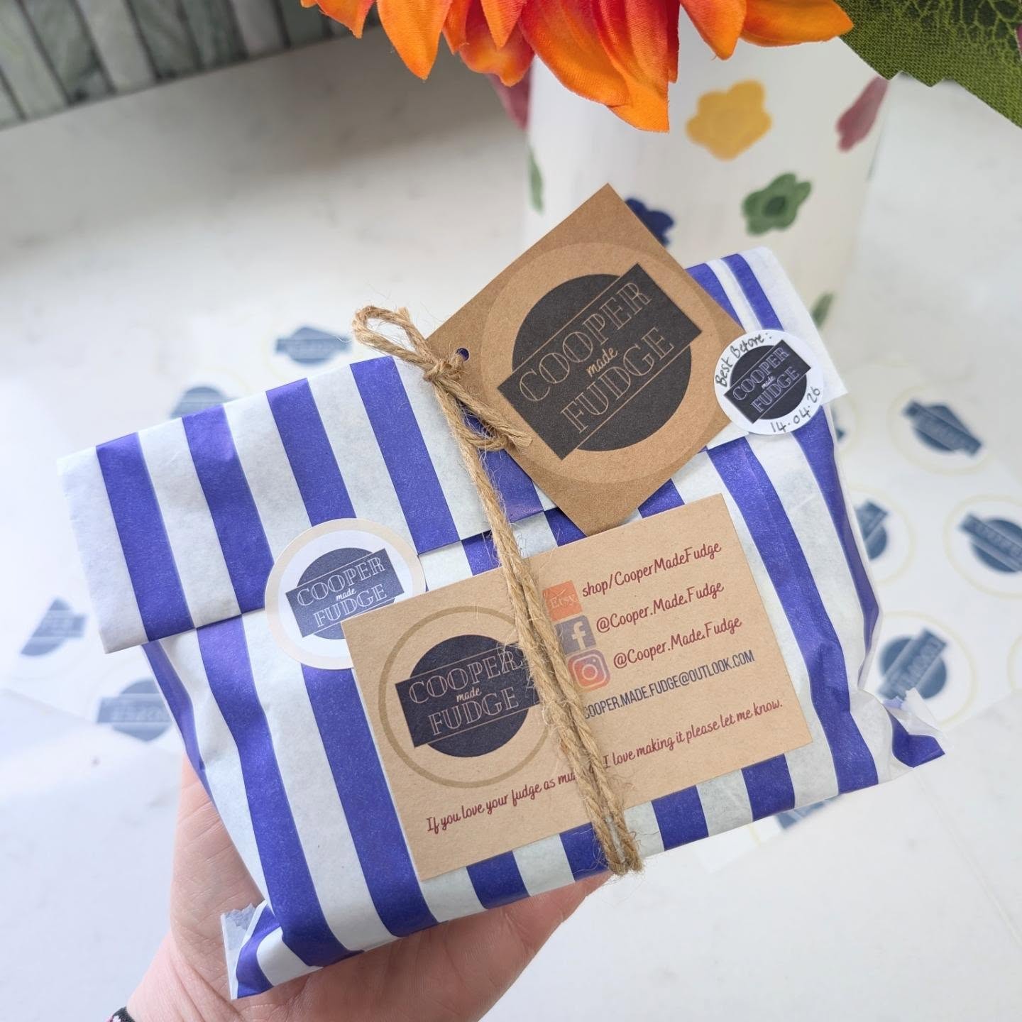 Cooper Made striped gift bag with hand-tied tag